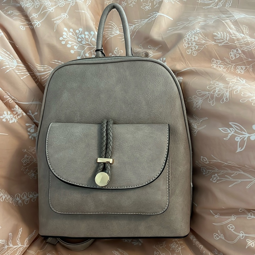 Tanish grey backpa purse. NWT